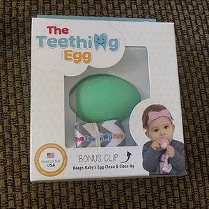 N.I.B mint green teething egg, grippie stick& clip
